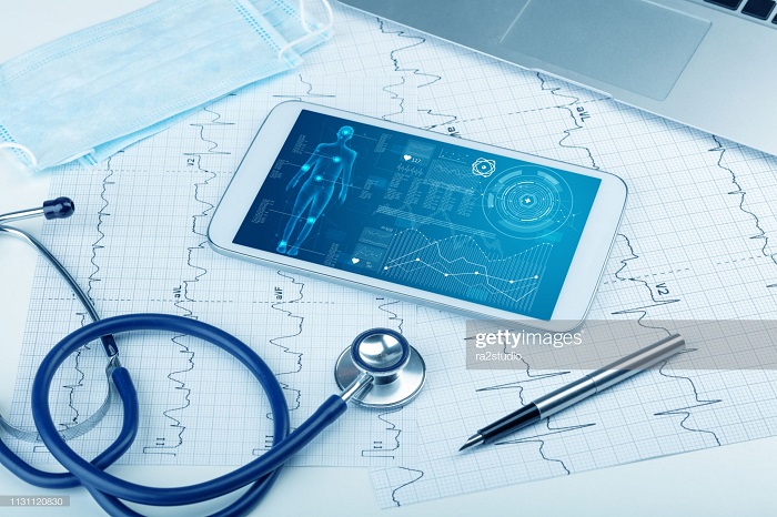 Stethoscope, tablet and pen