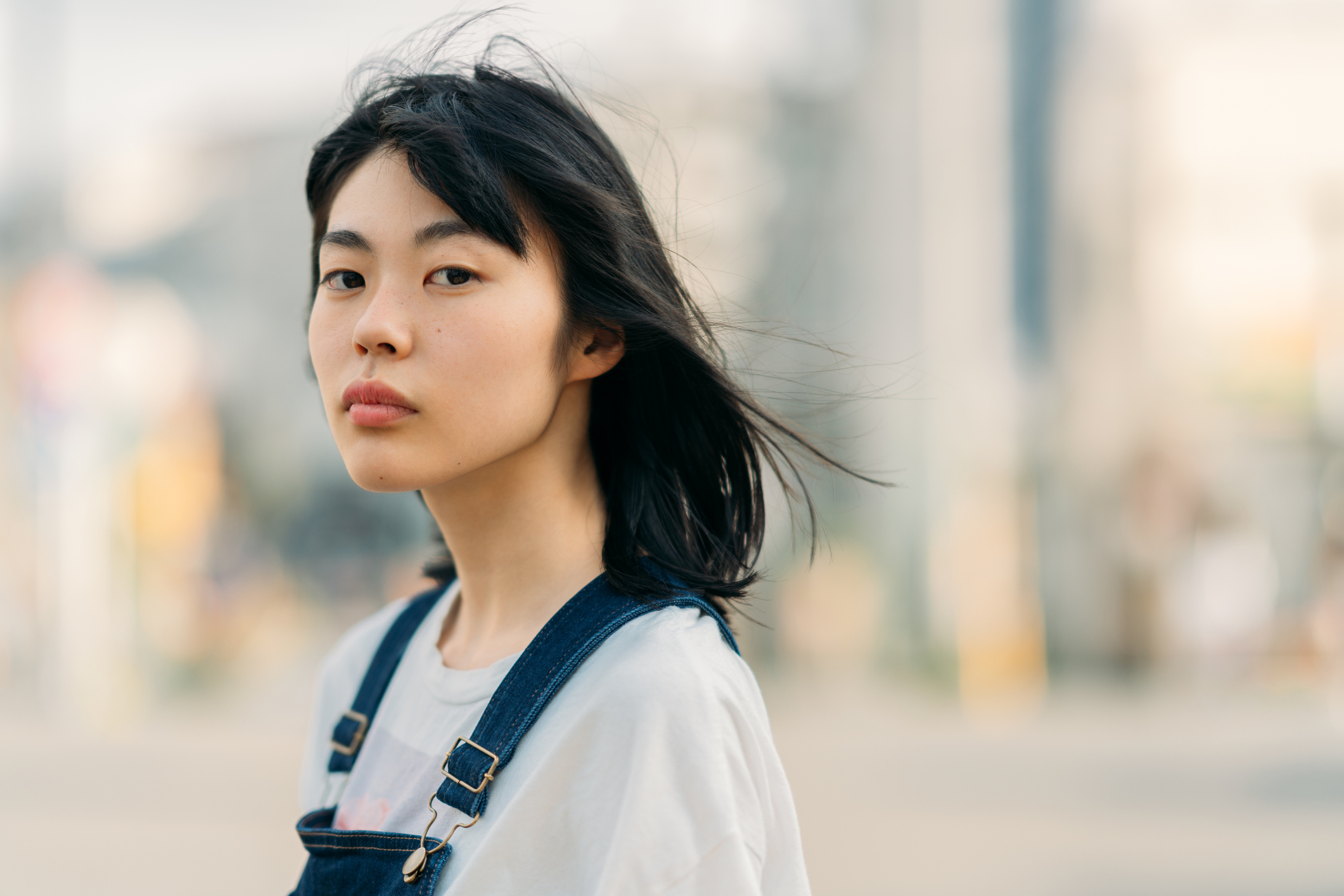 Portrait of young woman on windy day