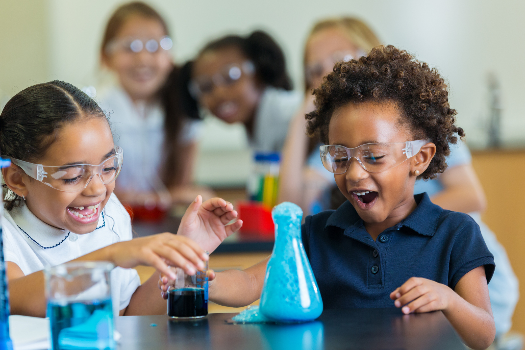 Two girls doing a science lab experiment