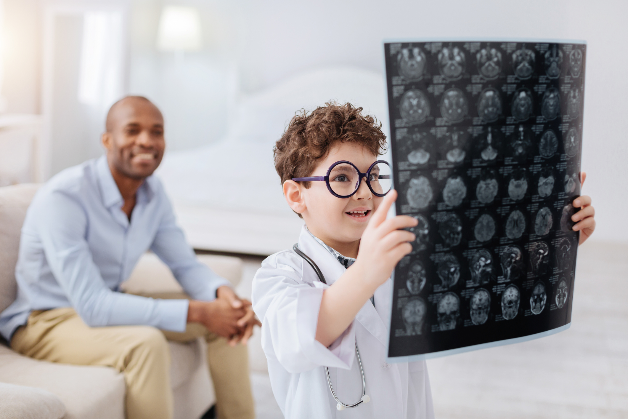 Boy examining brain imaging