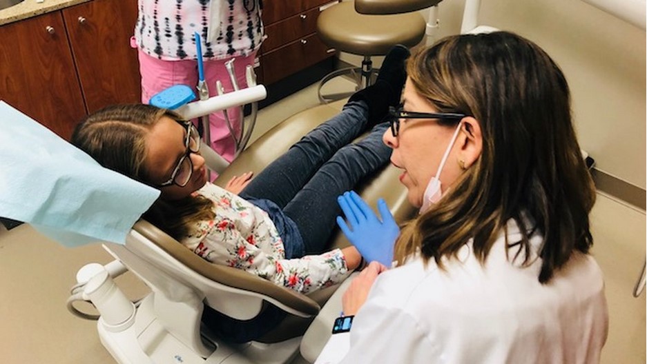 Dr. Karina Miller with patient