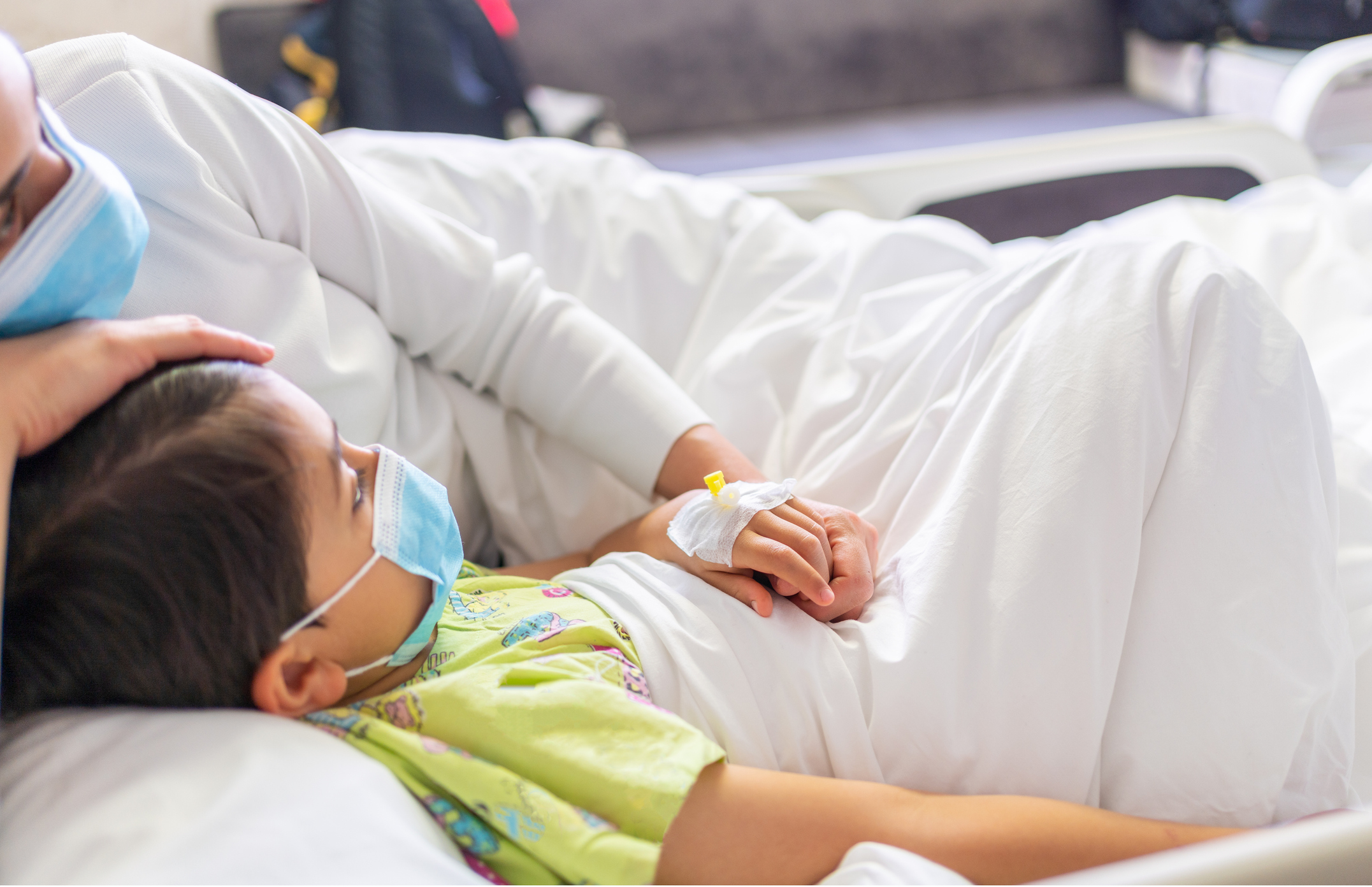 Boy in hospital bed