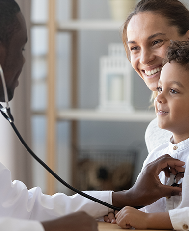 Male pediatrician hold stethoscope exam child boy patient