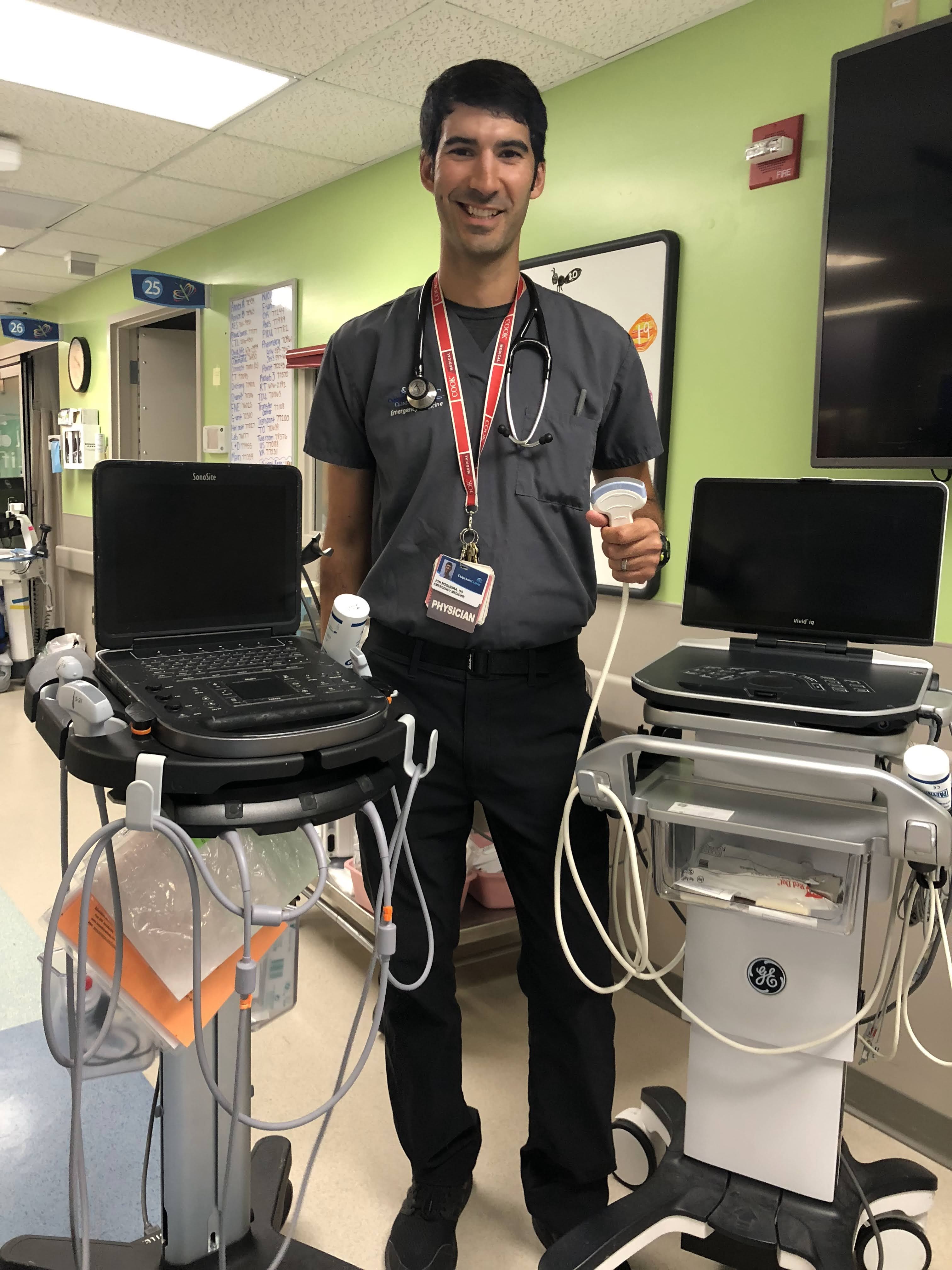 Dr. Jon Nogueira showing off US equipment