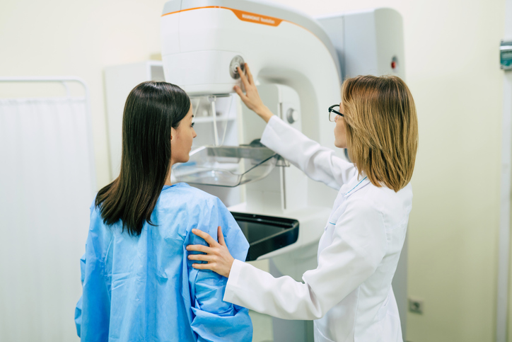 a woman getting a mammogram