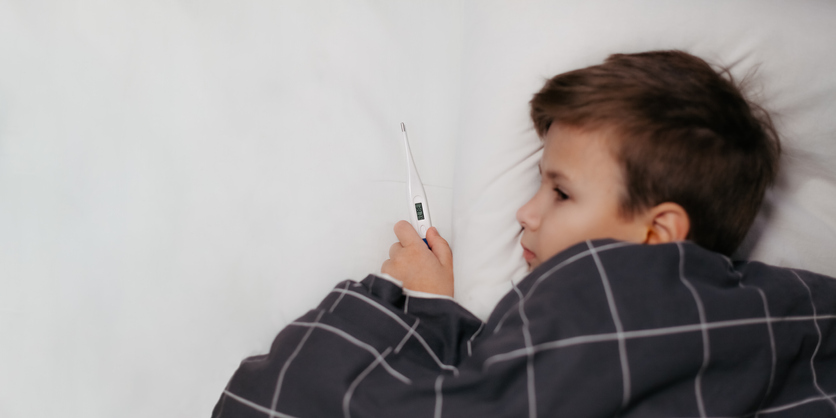 a child in bed sick