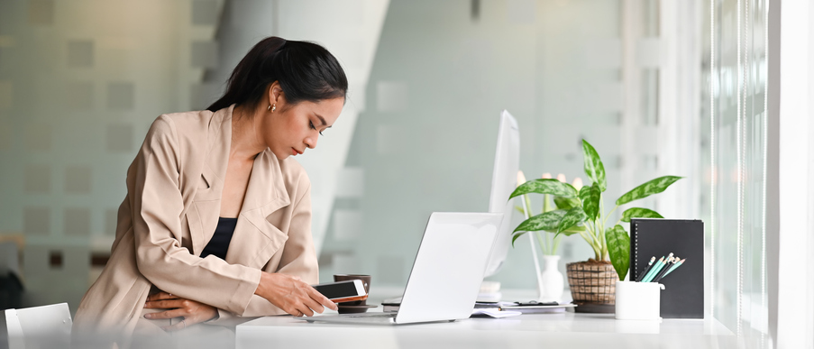 a woman sitting at a desk