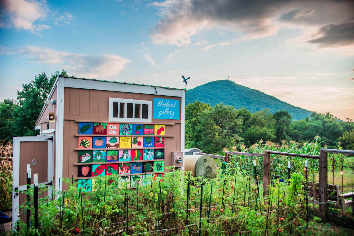 Painted tiles in art gallery at Morningside Urban Farm