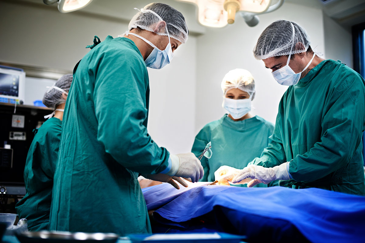 surgeons performing surgery