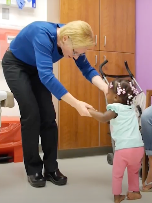 apfel helping patient walk