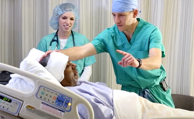 Dr. Marvin with patient 