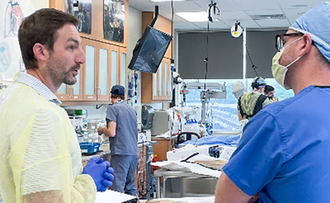 Dr. Witcher DBS Research photo with team member 