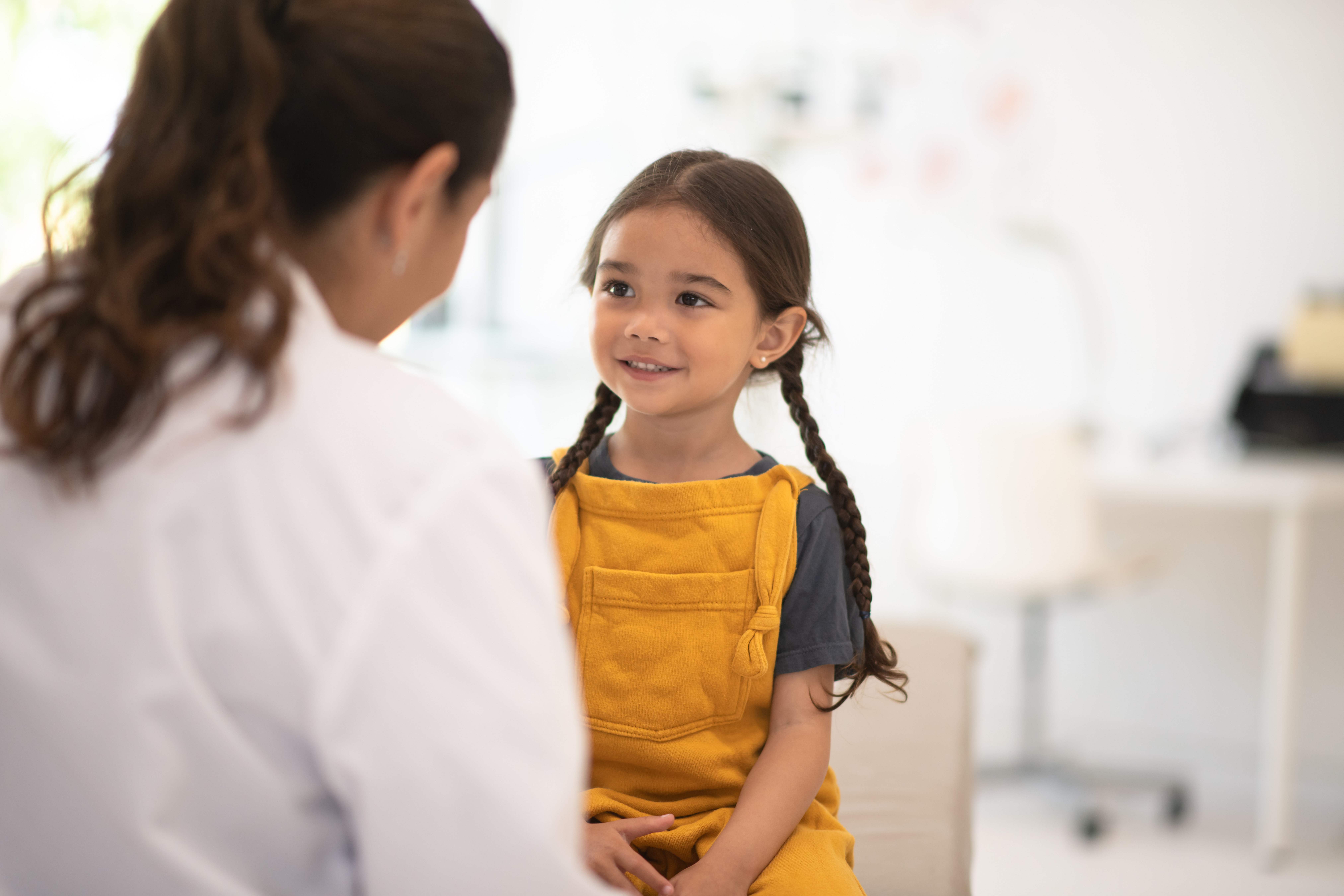 young girl patient meeting with doctor