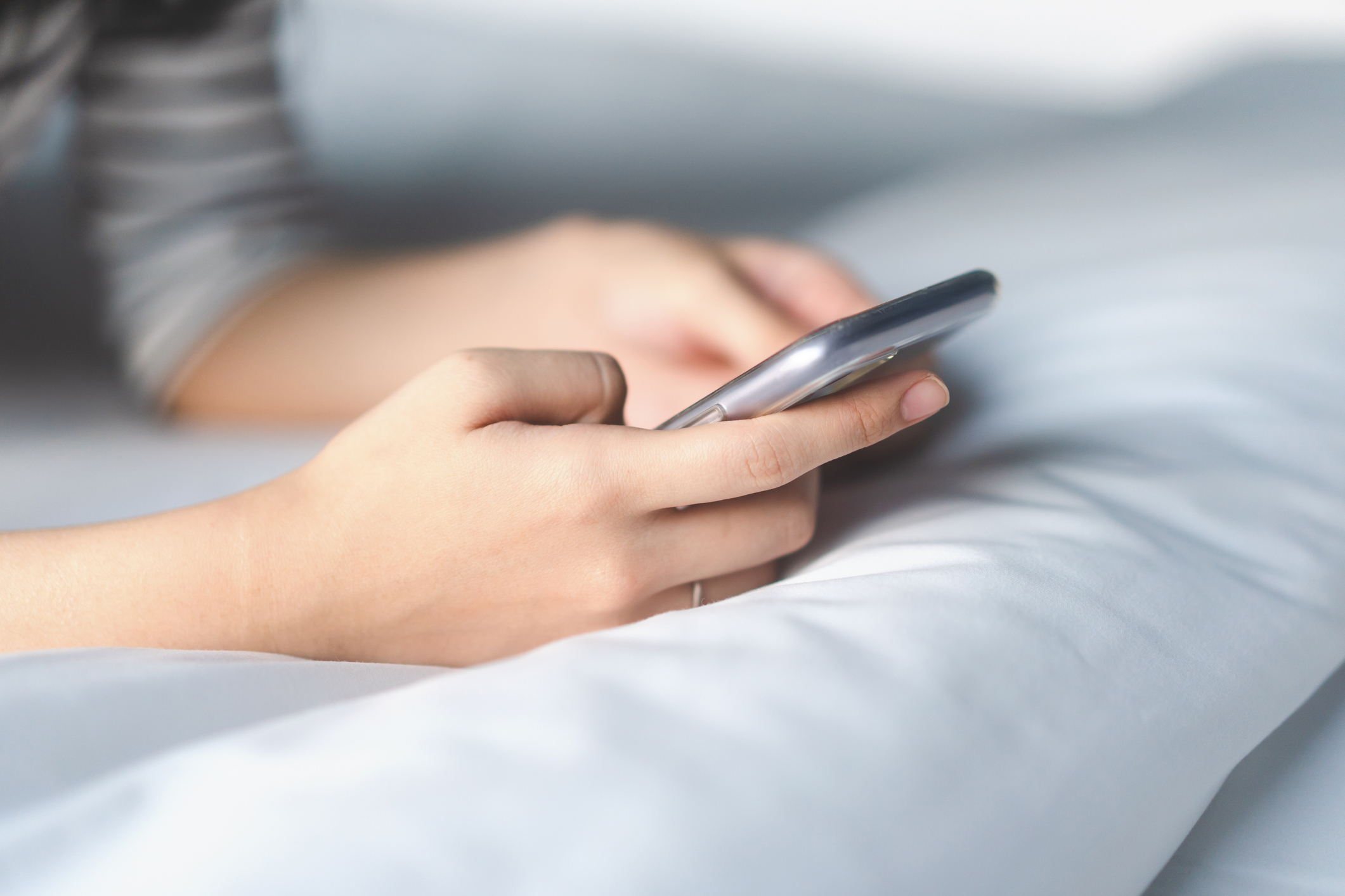 Person holding a cell phone