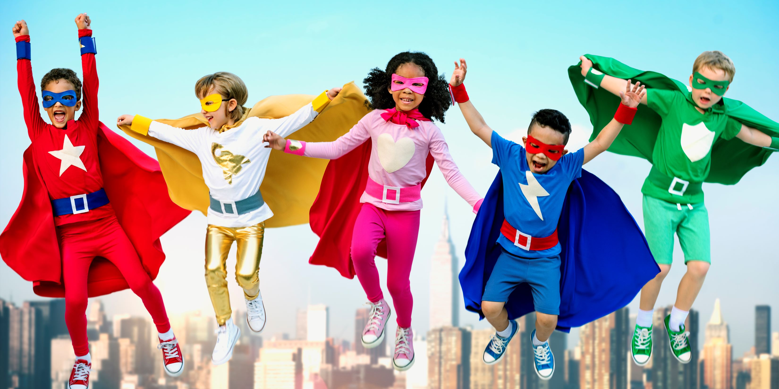 kids dressed as superheroes image