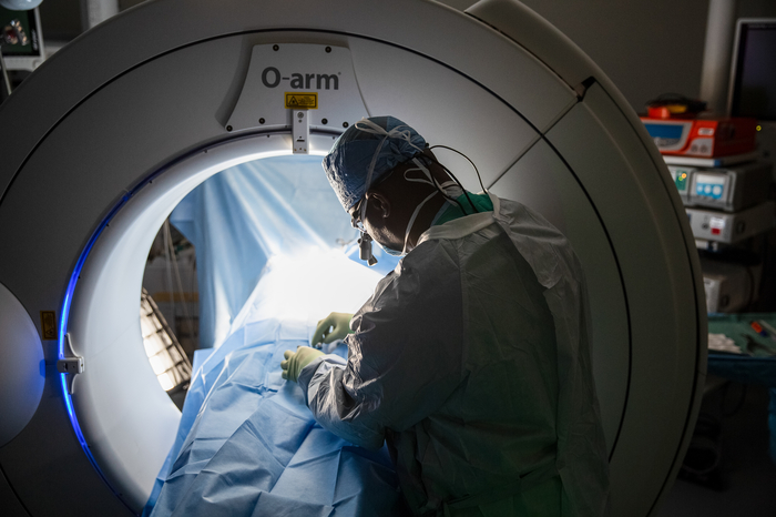 Dr. O with O Arm in surgery 