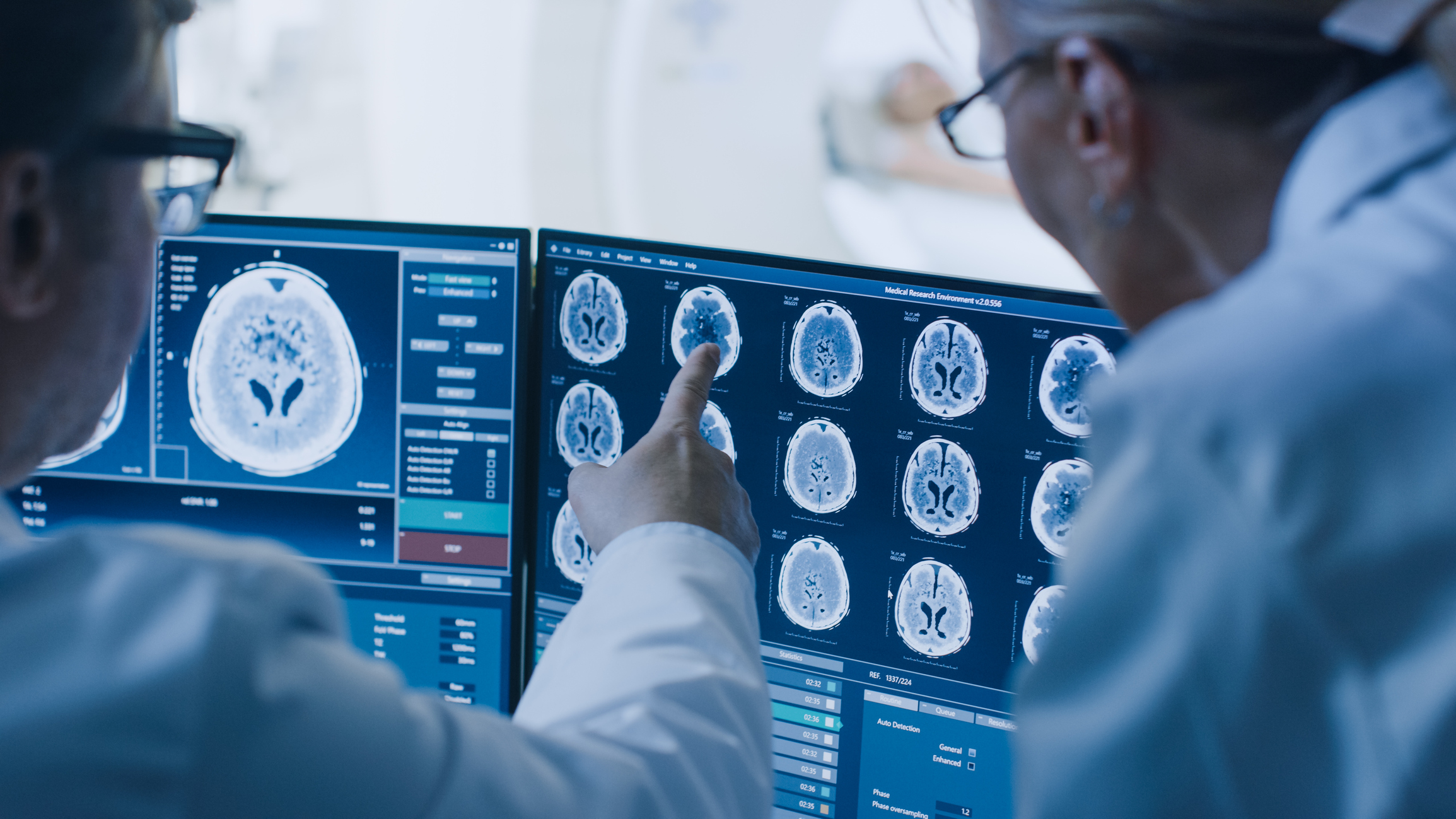 Doctors review brain scans