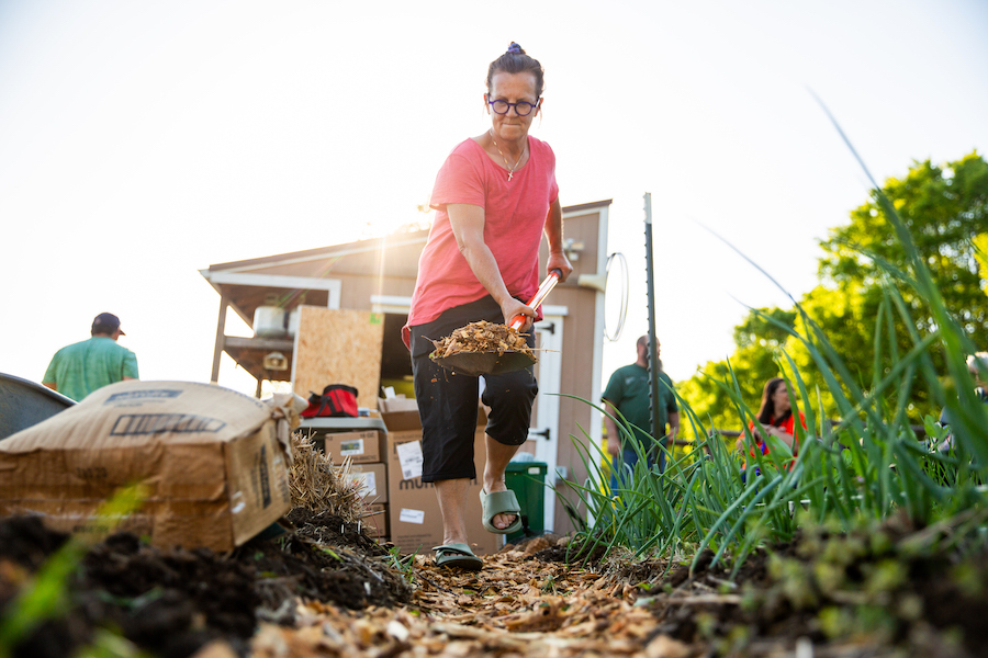 Woman gardening at Morningside Urban Farm